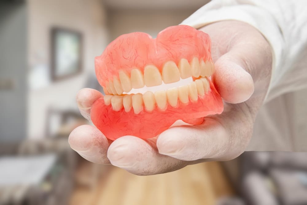 Chewing With Dentures: A Denture Wearer’s Guide to Bite and Occlusion